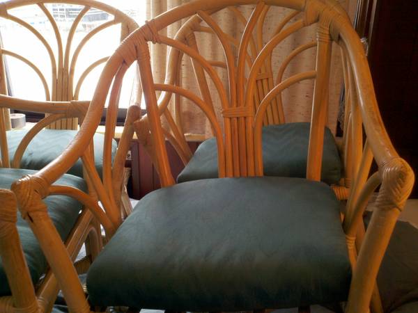Rattan Chairs (set of 4) $80 - These chairs would look great in a sunroom or screened in porch or in a breakfast nook, with a coat of spray paint and new cushions they would be totally transformed. 