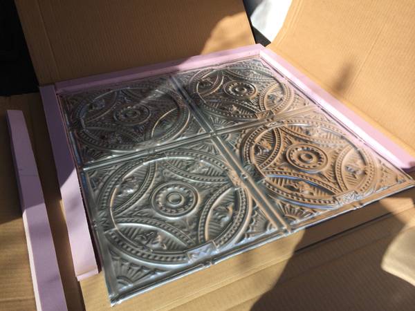 Reproduction Tin Tiles $20 for 2 - These would look really good hanging on the wall as art, could be used as is or painted. 