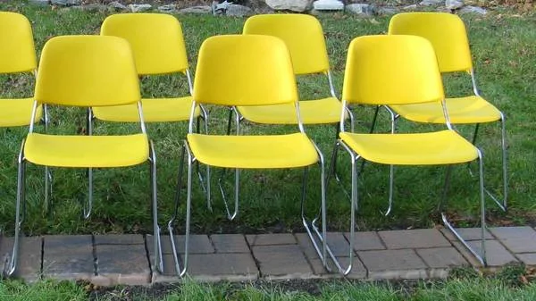 Vintage Stacking Chairs $80 for 6 - Seller has a total of 32 chairs some are blue and some are yellow, price varies based on how many you want. I think these would be cool office chairs or could be fun for a more modern kitchen table. 