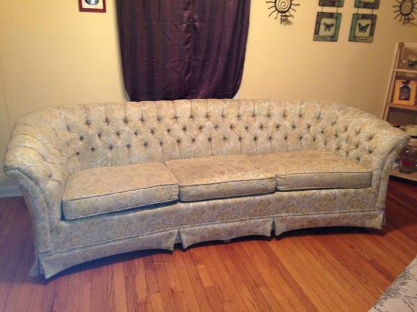 Antique Tufted Sofa $200 - I actually really like this couch. The tufting is great and it has a nice pattern. The overall look is fairly neutral and it doesn't scream "busy" I think it could be really pretty in a living room and for $200 its a good deal. 