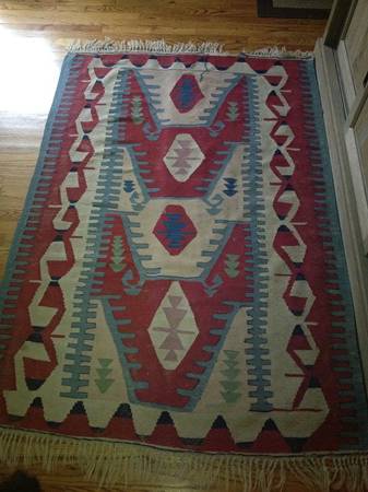 Antique 4' x 6' rug $250 - I love the design and colors on this rug, these would be a great piece to hang on the wall. 