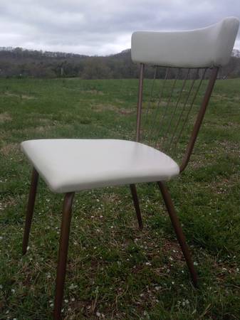 White Retro Chair $35 - This chair could look good paired with a modern desk. 