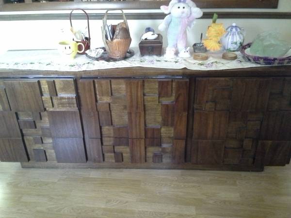 Buffet $100 - I love this piece, it has a lot of unique details and could be really cool in a modern dining room. I think this could be used as is or painted. 