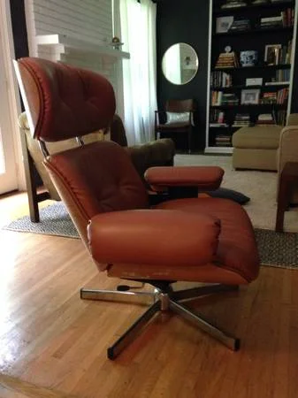 Eames Style Recliner $150 - These Eames style reproduction chairs sell for a lot, this one is missing the ottoman and is missing a button but if you were wanting an Eames chair and didn't want to break the bank this would be a great chair for you. 