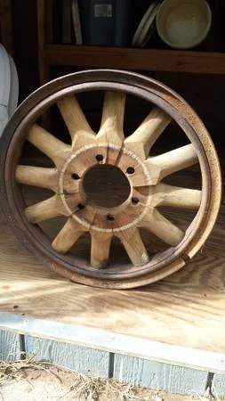 Antique Wood Spoke Wheel $80 - This wheel would look great hanging on the wall. 