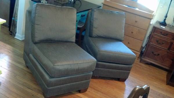 Pair of Brown Accent Chairs $100 - I can't quite tell from the photo what type of fabric is on these chairs but throw a cute decorative patterned pillow on each and they could be great accent chairs in a living or family room. 