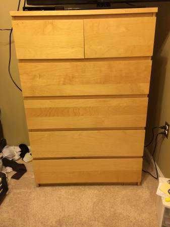 Dresser $25 - Seller is moving and needs to sell this by tomorrow. Think this could be a great modern piece, you could paint and even add hardware if you wanted. It's a good deal for $25. 