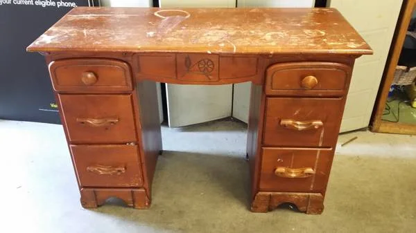 Desk $25 - This desk needs a little work, probably needs to be sanded and painted, but redone could be a great kid's desk.