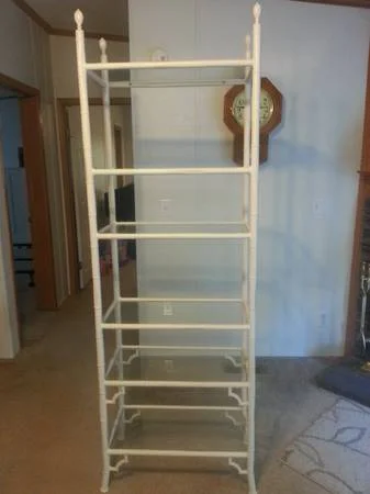 Metal and Glass Shelf $100 - I really like the look of this shelf (especially the bamboo accents) I think it looks nice as is but would look great painted gold. 