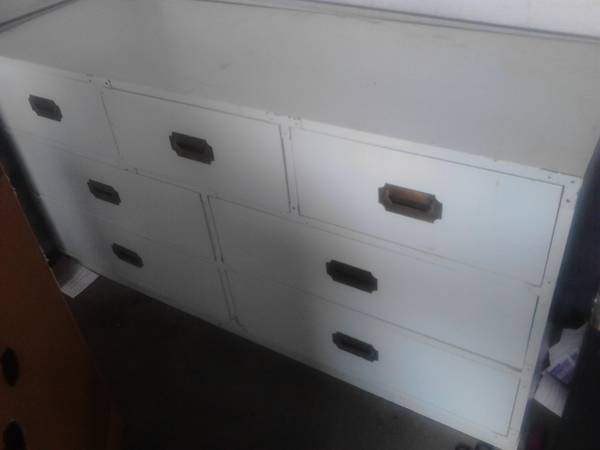 Campaign Style Dresser $50 - This is a good price, looks like it might need a bit of work but would look really nice once it was redone. Campaign style furniture is popping up everywhere, for some examples of similar pieces visit my Pinterest page . 