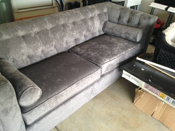 Grey Tufted Chesterfield Sofa $400 - Seller said that this sofa is brand new, they are selling because they couldn't fit it upstairs in their bonus room. 