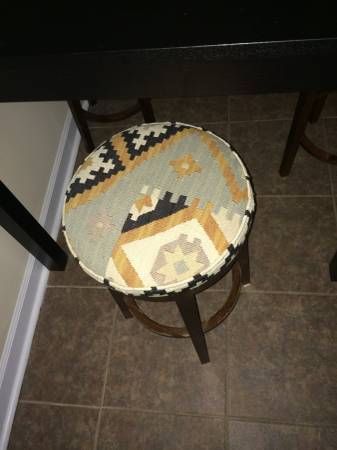 Set of Four Stools $50 - This is a good deal for all four and I like the fabric on them. Seller is also selling a bar height table that could be used with these stools for %75. 