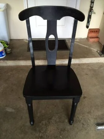 Black Pedestal Table with Four Chairs $150