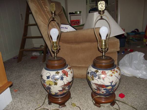 Pair of Ceramic Lamps $50 obo - I think these lamps could be really elegant with some new shades and possibly with the wood portion painted.