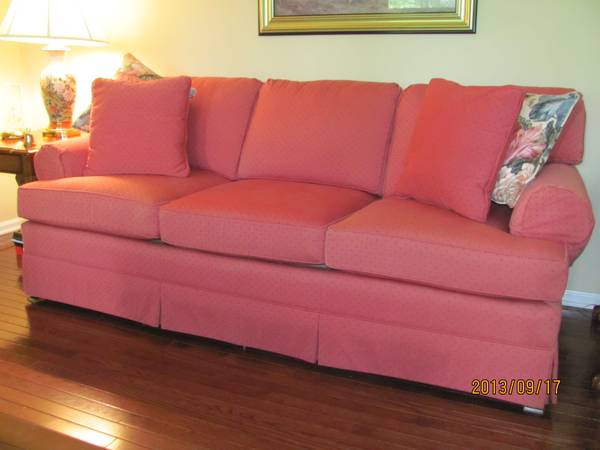 Raspberry Colored Sofa $350 - This could be really pretty with some new decorative pillows. Check out this post on Apartment Therapy with some great photos of rooms with pink sofas. 