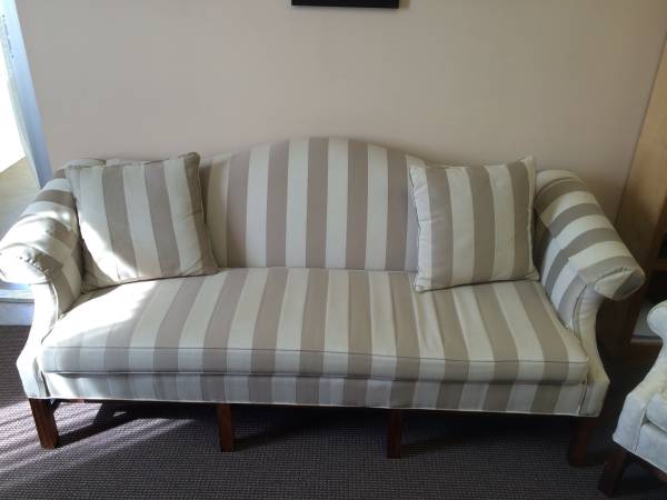 Striped Sofa and Chairs $200 This sofa is being sold with 2 wingback chairs. I think this sofa could be really pretty in a living or family room and stripes are a pattern that will never go out of style. I'd remove the pillows on it and replace with new ones all in the more neutral color palette. You could also paint the wood legs the gray/khaki color of the darker stripe and it would modernize it. See My Idea View on Craigslist
