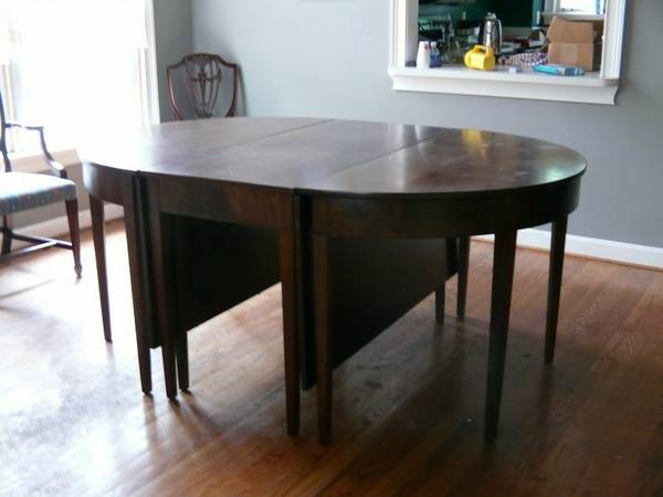 Dining Table with 2 Leaves $200 This seller is also selling the chairs you see in the back of the photo - 6 for $200. View on Craigslist 