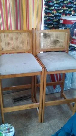 Pair of Stools$10 These need some work but would look great with a fresh coat of paint and a reupholstered seat.&nbsp;View on Craigslist