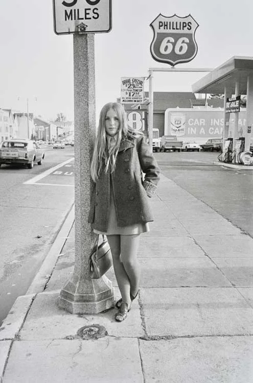 Untitled (Young girl next to Phillips 66 sign), 1960-1972 Gelatin Silver Print 20 x 16 inches