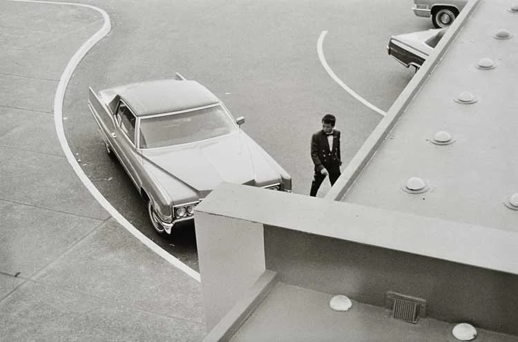 Untitled (Car and valet from above), 1960-1972 Gelatin Silver Print 16 x 20 inches