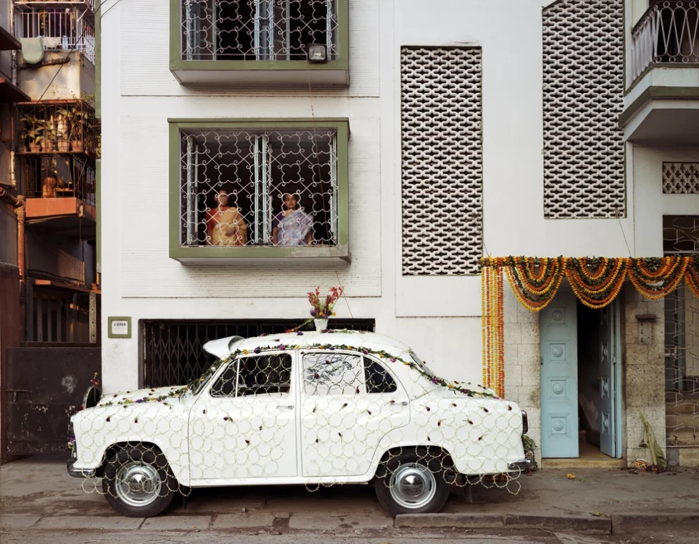 Ambassador Car Decorated for a Wedding by a Net Strung with Fresh Flowers, South Kolkata, 1998