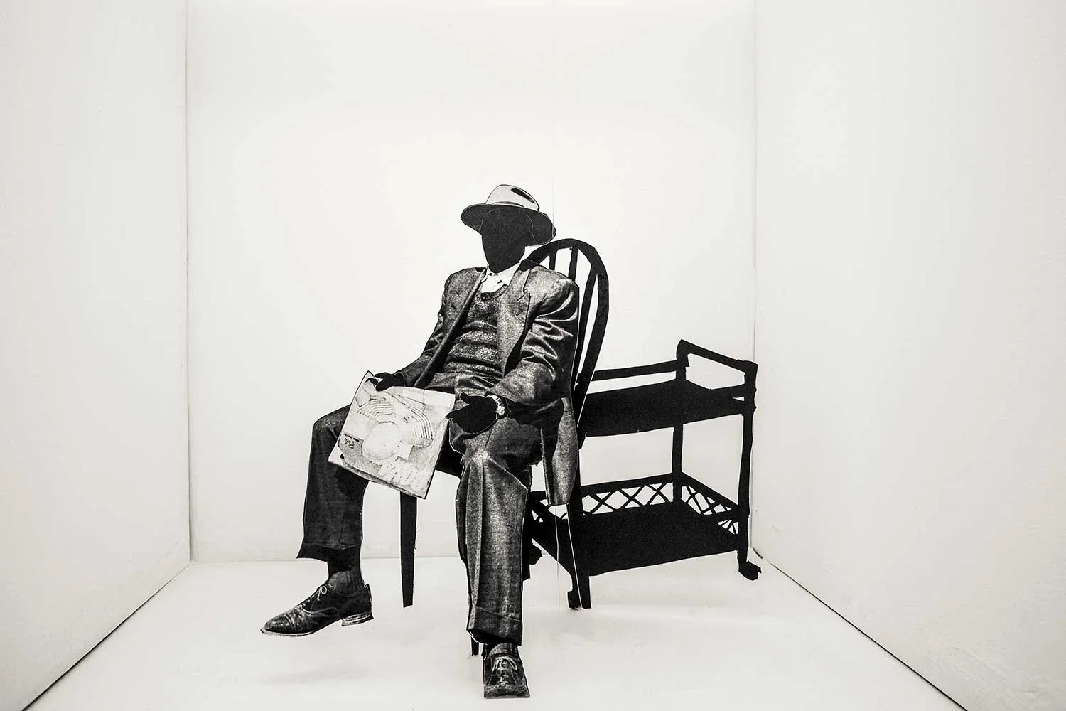 Lebohang Kganye O robetse a ntse a bala Bona, from the series Reconstruction of a Family , 2016