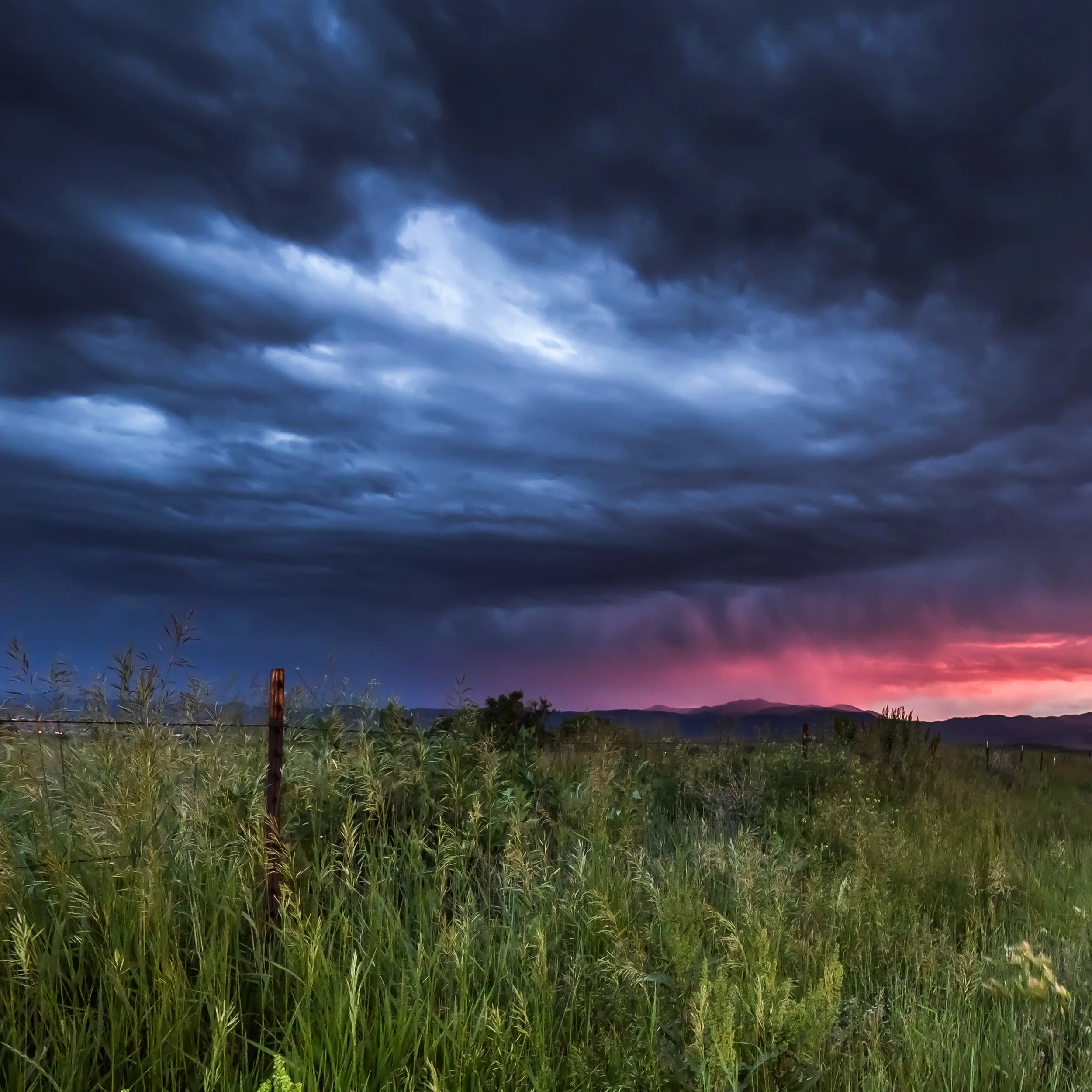 Pink Sky - 12x12 print in a 16x16 mat Taken on June 13, 2015 near the Westminster Hills Dog Park. I had never seen the sky this color. I had to pull over and get a shot (or 50). It was the perfect end to a crazy/beautiful sky day. First shown at the Denver Art Society - November 2016 First Friday.