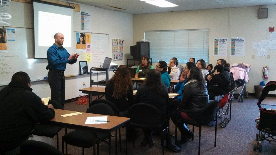  SIREN community organizer Jeremy Barousse delivering a know your rights presentation&nbsp;to the Spanish-speaking parent club at Selma Olinder Elementary School. 