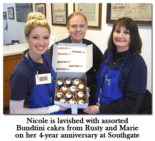 Nicole Hoff is treated on her anniversary at Southgate Coins while buying and selling coins, gold, and silver.