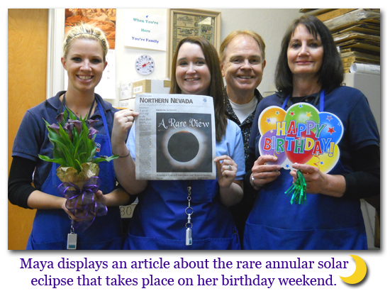Southgate Coins employees celebrate manager Maya Jones' birthday with her at the Reno coin shop