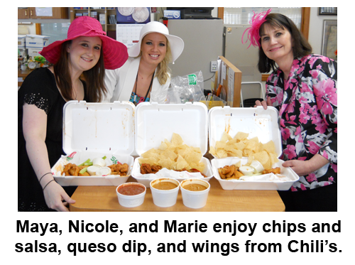 Southgate Coins employees enjoy food during the Kentucky Derby Day celebration