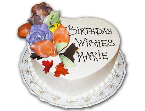 Marie Goe enjoys her Southgate Coins birthday cake