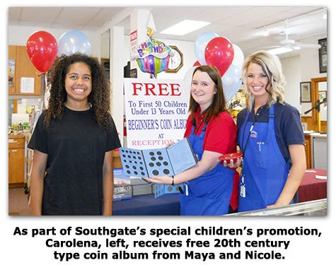 Carolena receives 20th century type set at Southgate Coins 10 year anniversary