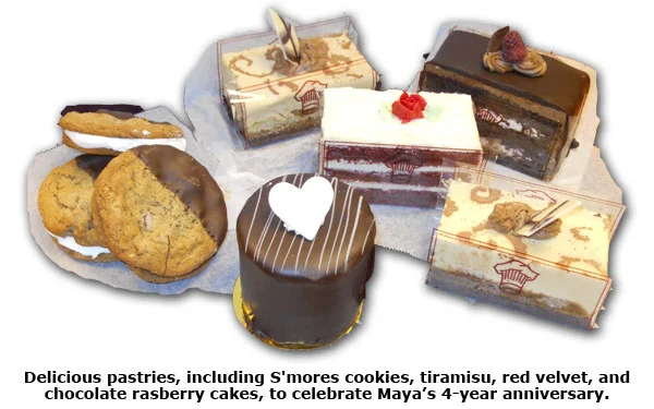 Southgate Coins employee Maya Roberts is treated with pastries from Josef's Bakery for her anniversary celebration
