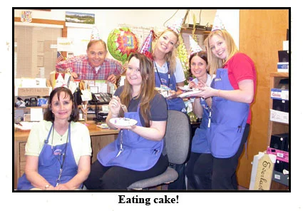 The staff at Southgate Coins gather to wish Maya a happy birthday