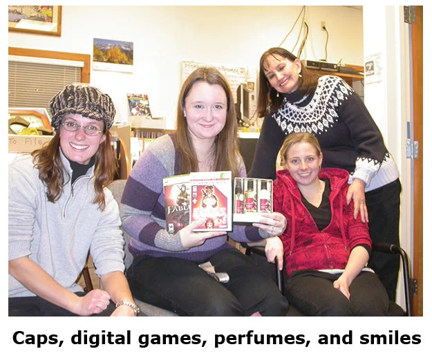Cristal, Maya, Cara, and Marie pose for a holiday picture at the coin shop