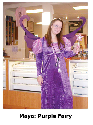 Southgate Coins employee Maya dons purple wings for Halloween