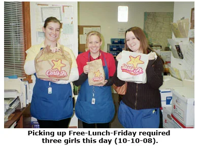 Brittany, Cara, and Maya pick up Free Lunch Friday at Southgate Coins