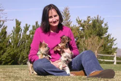 Southgate Coins owner Marie Goe welcomes puppy Lillie into the family