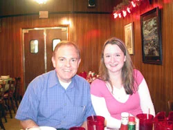 Rusty and Maya pose with dinner at the Basque restaurant