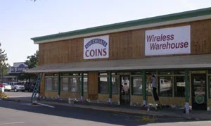 Southgate Coins is stripped of its fascia during the renovation