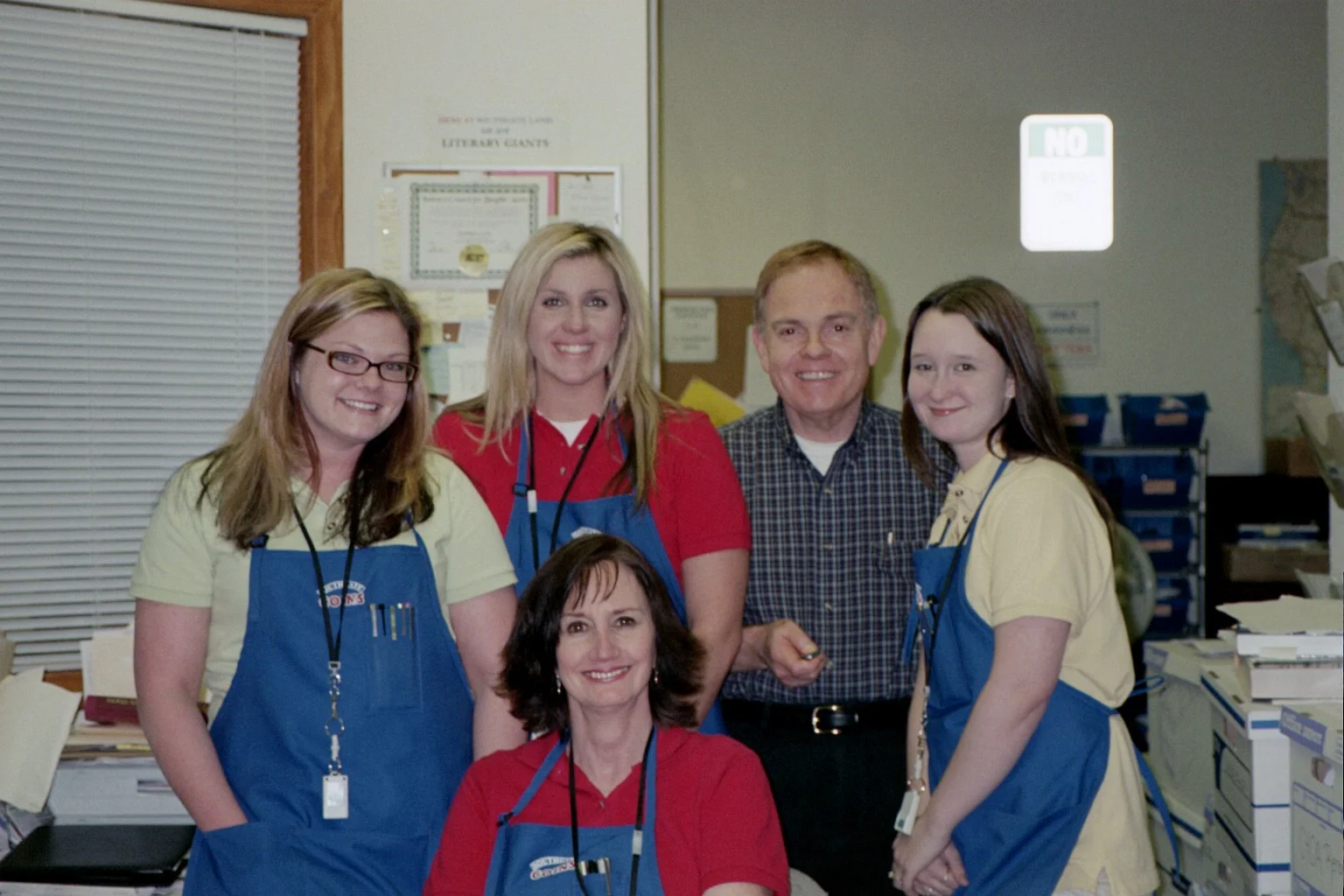 Southgate Coins staff poses in the back room.