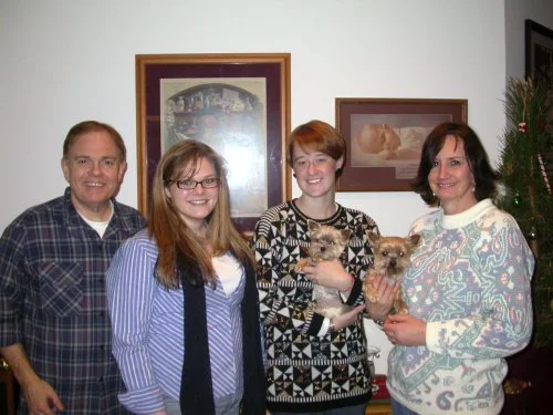 Southgate Coins owners Rusty and Marie celebrate Christmas with Amy and Kelsey