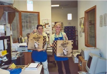 Southgate employees retrieving traditional Free Lunch Friday food