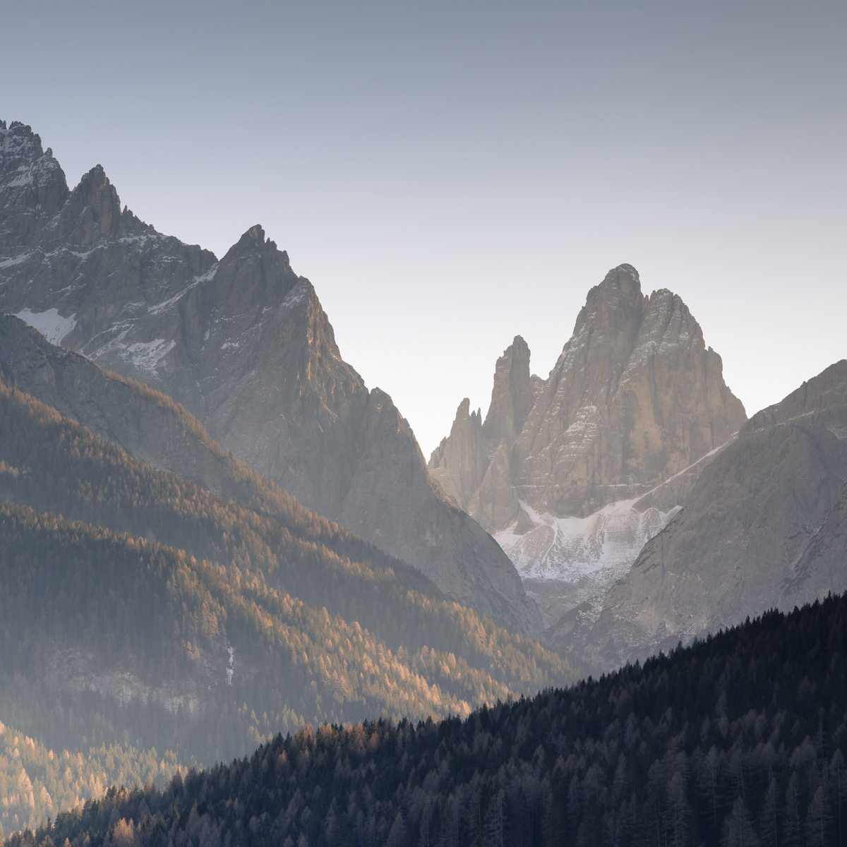 Late afternoon Sun dipping below the sharp peaks often provides great photographic opportunities.