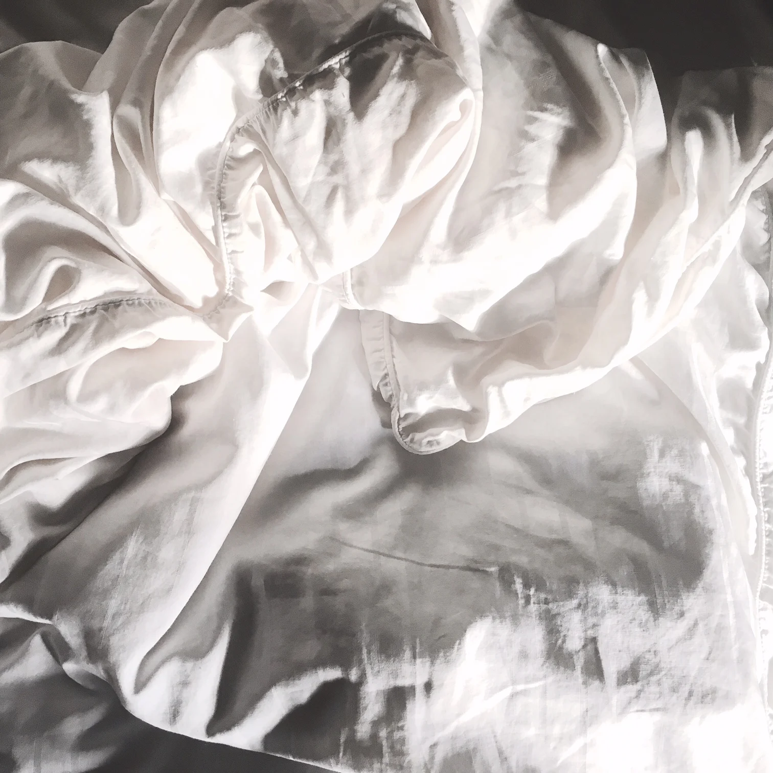 A simple, white duvet is just the beginning of decluttering your way, and bedroom into mindfulness.  