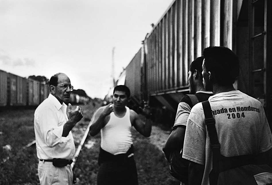   Father Alejandro Solalinde gives security tips to migrants before the train departs. In March 2007, Solalinde was arrested and beat severely by the police after trying to help a group of 16 Guatemalan indigenous people kidnapped by the local mafia.