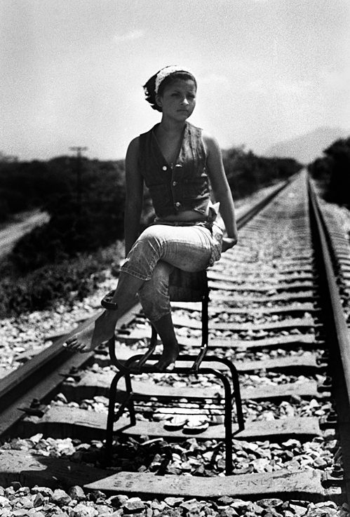   Scarlet   (one of the many names she uses) is 13 years old. She travels alone to find her mother in California.    Ciudad Ixtepec, Oaxaca, Mexico. 2008     