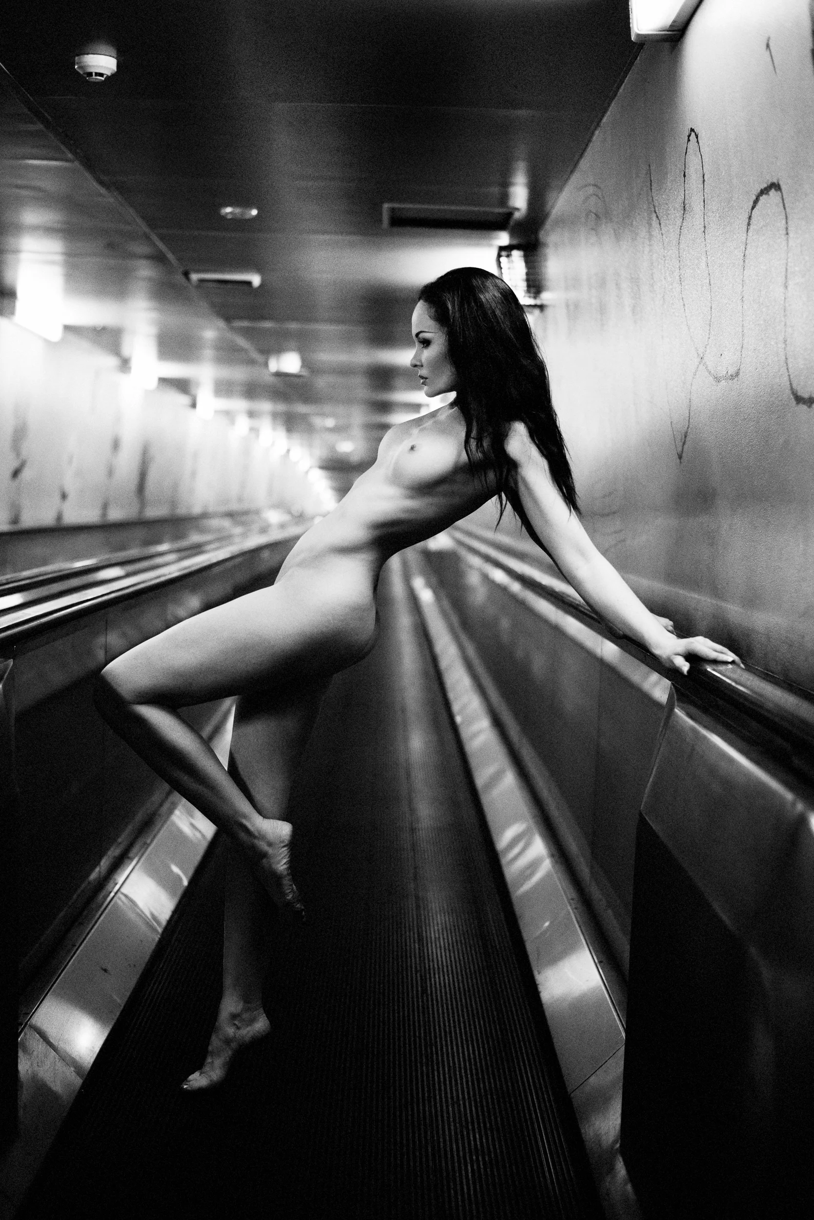 Anne Duffy catching the escalator to the Domain carpark - Sydney