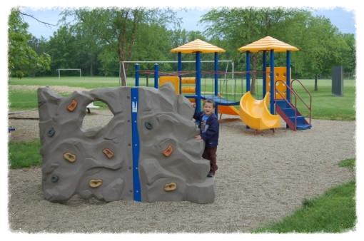 Loveless Park playground features a climbing wall for the kiddies.